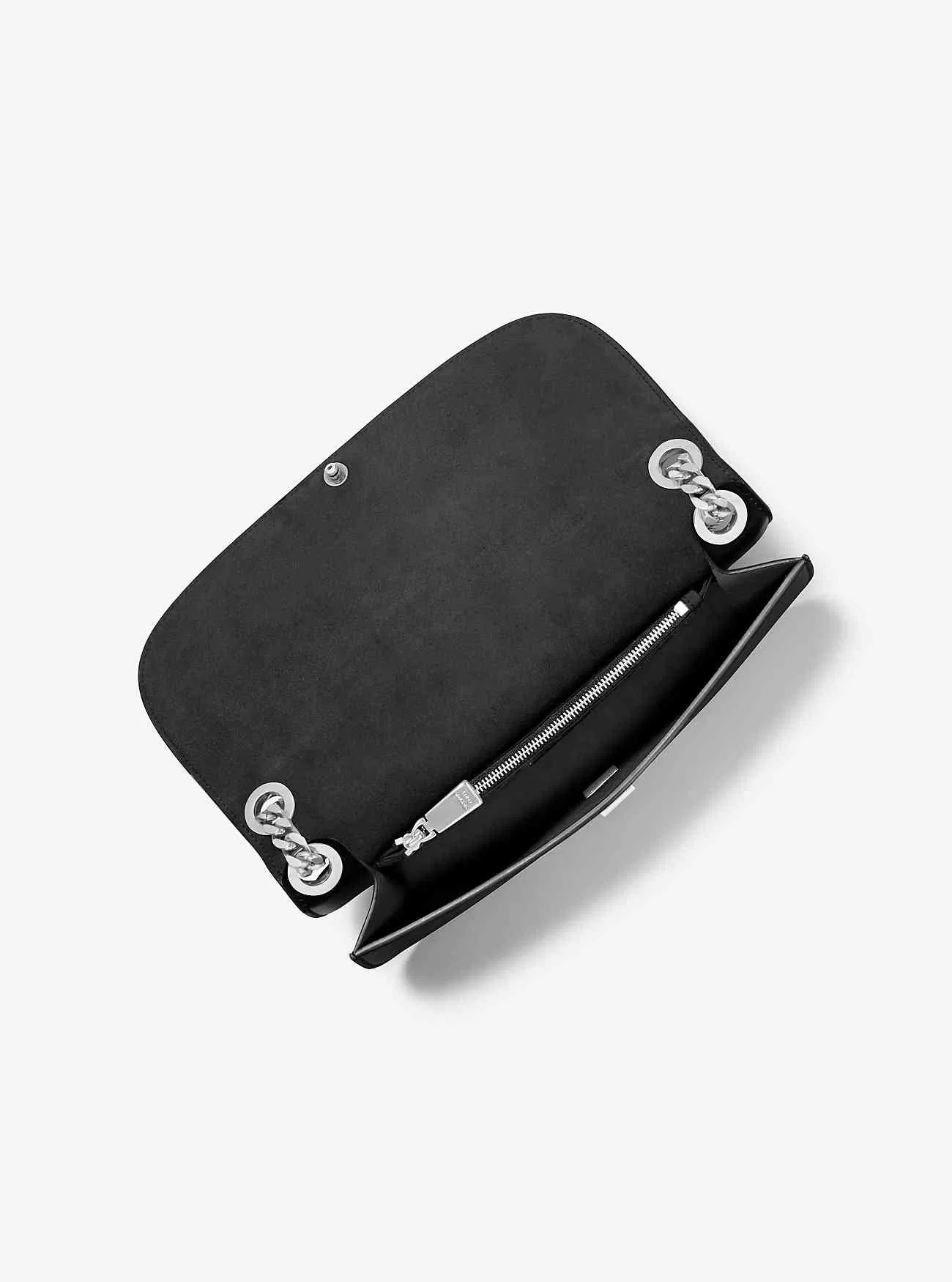 Christie Medium läder kuvertväska