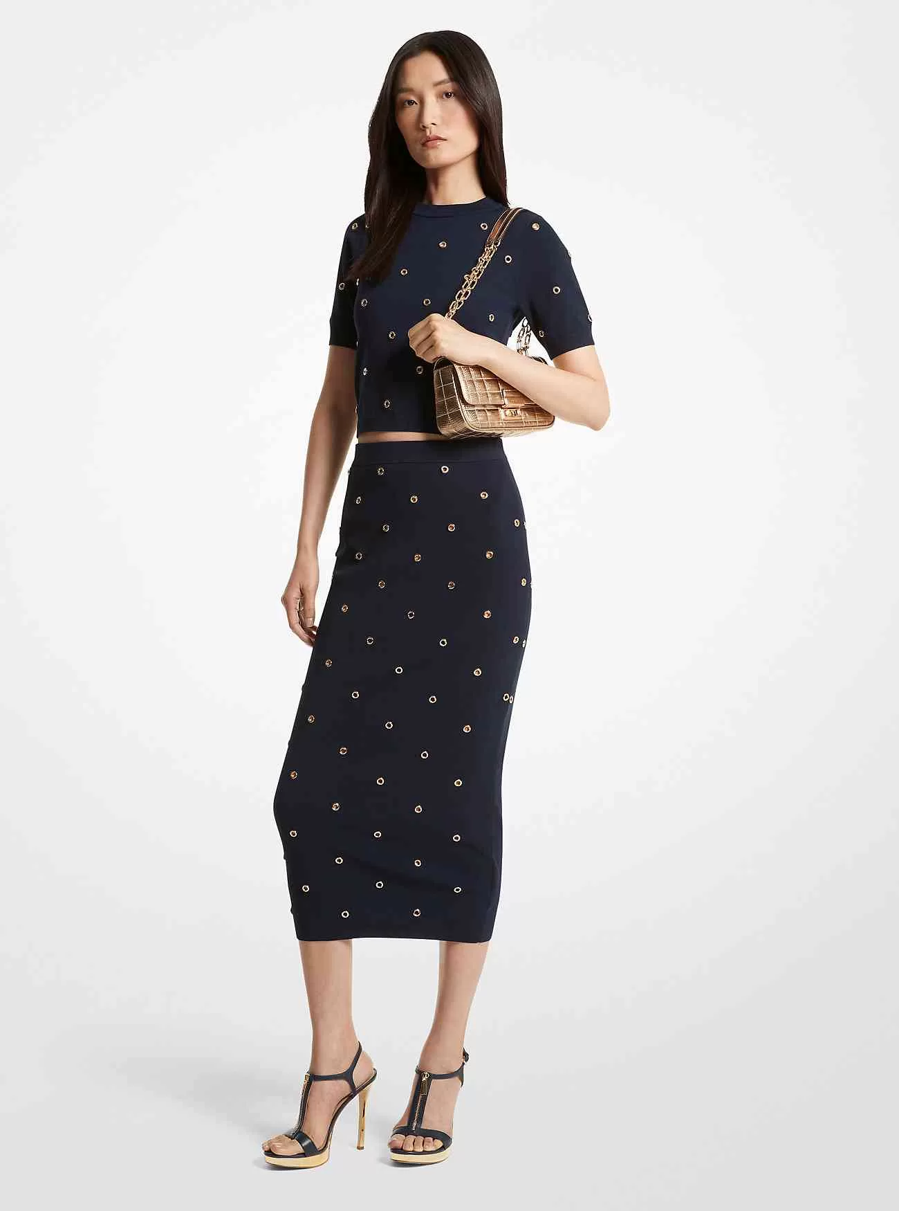 Grommet-utsmyckad stretchstickad pennkjol