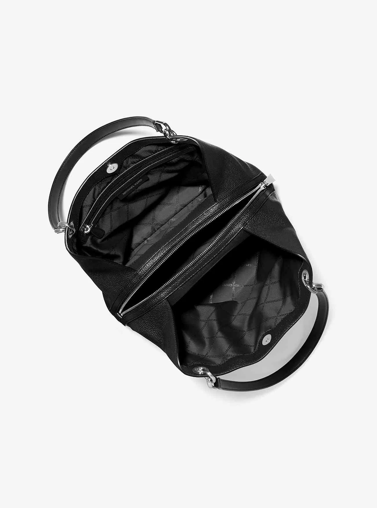 Kensington stor tygväska i läder i sten