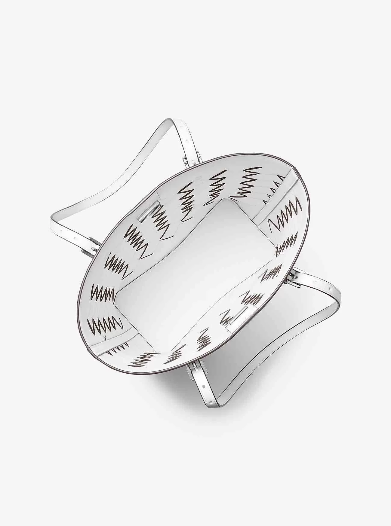 Quinn stor tygväska i vävt läder