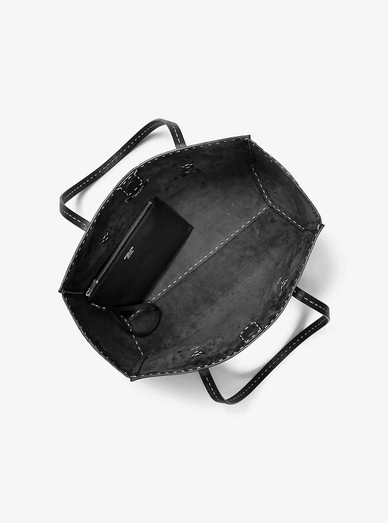 Sharon handsydd tygväska i stenigt läder